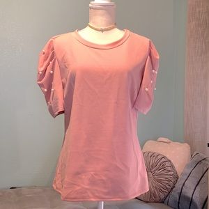 Pink Fashion Magazine poof shoulder blouse, embellished with faux pearls